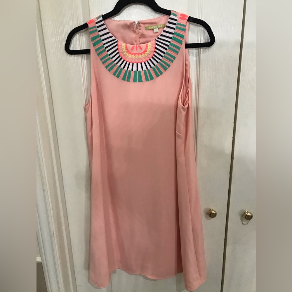 Beautiful peachy pink sleeves less dress.  Embroidery bodice front and back.